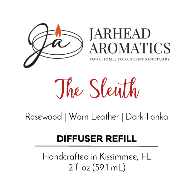 Jarhead Aromatics logo with candle flame and The Sleuth - Diffuser Refill, an enigmatic blend of rosewood, worn leather, and dark tonka. Handcrafted in Kissimmee, FL. 2 fl oz (59.1 mL).