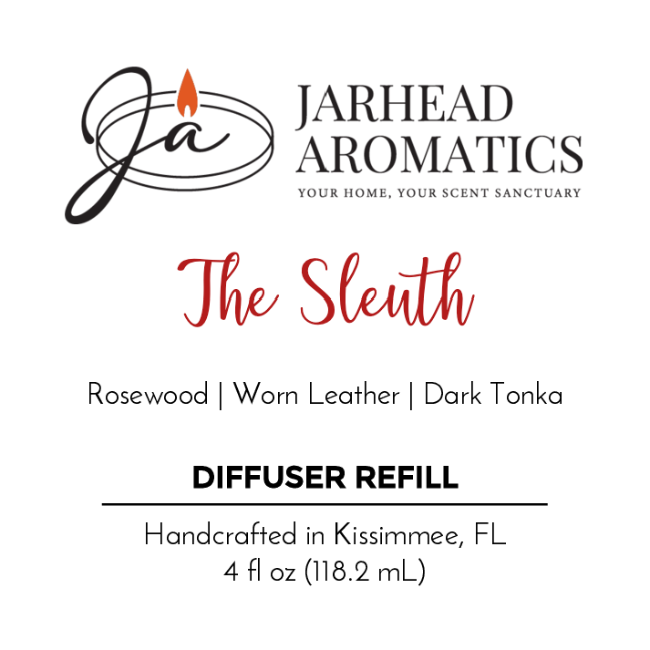 Label for Jarhead Aromatics’ The Sleuth Diffuser Refill—woody rosewood, worn leather, and dark tonka scents. Handcrafted in Kissimmee, FL. 4 fl oz (118.2 mL). Includes logo and scent details.