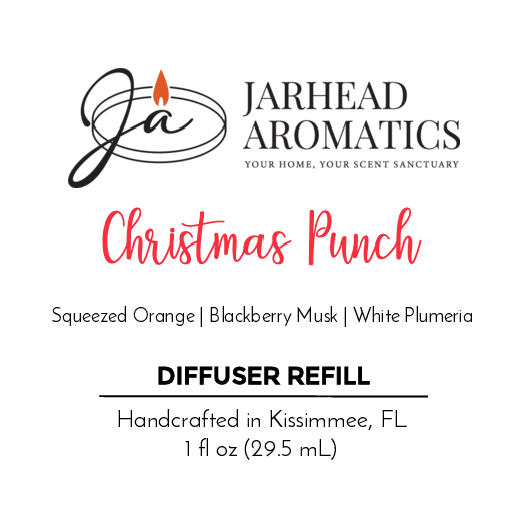 The Christmas Punch car diffuser refill by Jarhead Aromatics, featuring a logo with a lit candle motif, captivates with fruity and festive aromas of squeezed orange, blackberry musk, and white plumeria. Handcrafted in Kissimmee, FL, it comes in a 1 fl oz (29.5 ml) volume.