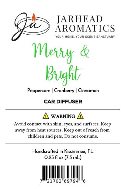 Product label for a Jarhead Aromatics Merry & Bright Car Diffuser | Citrus Cranberry, Warm Spice & Fir featuring the text Merry & Bright, scent notes of Peppercorn | Cranberry | Cinnamon, safety warnings, and a barcode.
