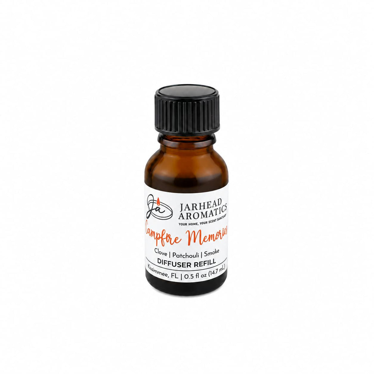 A small amber glass bottle labeled Jarhead Aromatics Campfire Memories Cold Air Diffuser Refill features maple, clove, and smoky ember scents. Ideal as a campfire diffuser refill or home fragrance oil, the bottle has a black screw cap and a white label with red and black text.