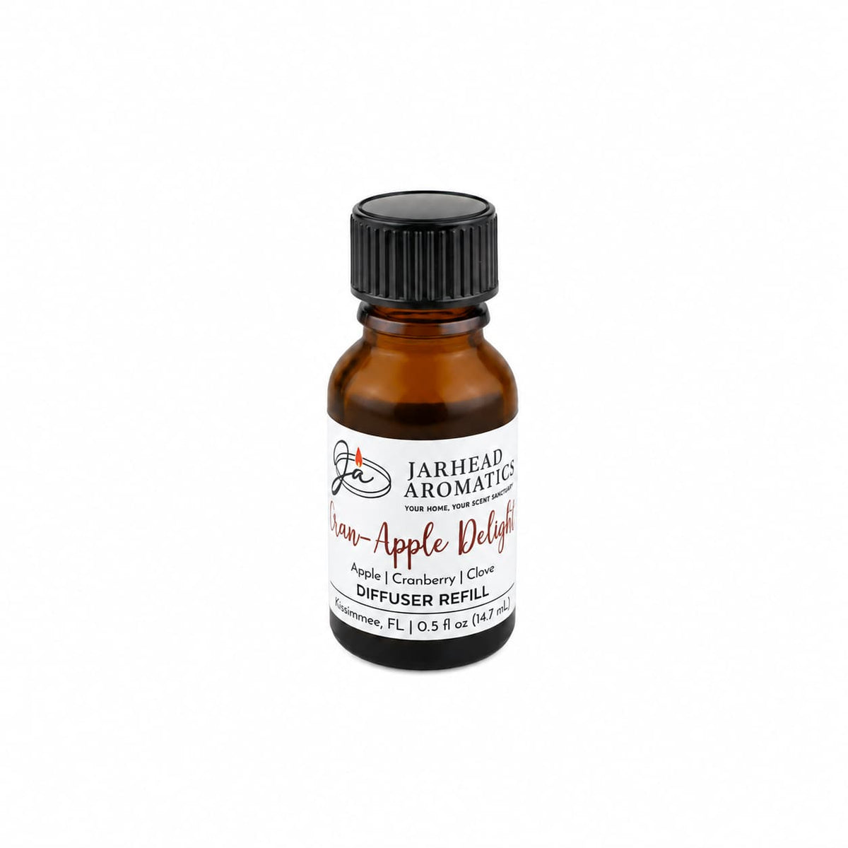 A small amber glass bottle labeled Jarhead Aromatics Cran-Apple Delight Cold Air Diffuser Refill, featuring a home fragrance oil blend of cranberry, apple, and warm cinnamon scents, set against a white background.