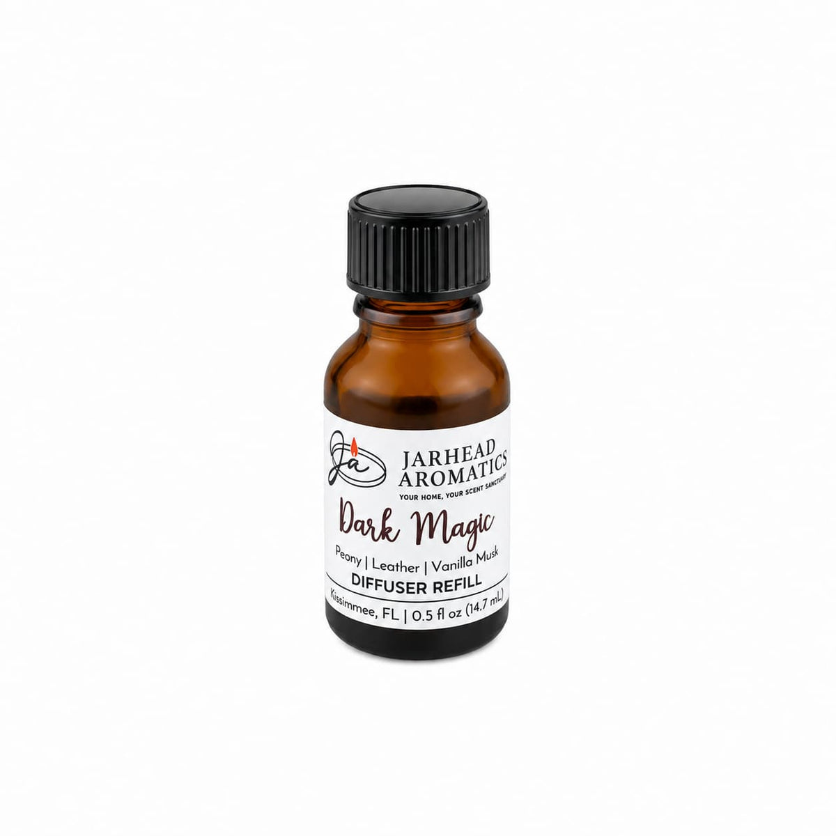 A small amber glass bottle labeled Jarhead Aromatics Dark Magic Cold Air Diffuser Refill, featuring notes of peach, plum, dark florals, and vanilla musk, evokes the allure of gothic romance. Suitable as a home fragrance oil or cold air diffuser refill, it is displayed on a white background.