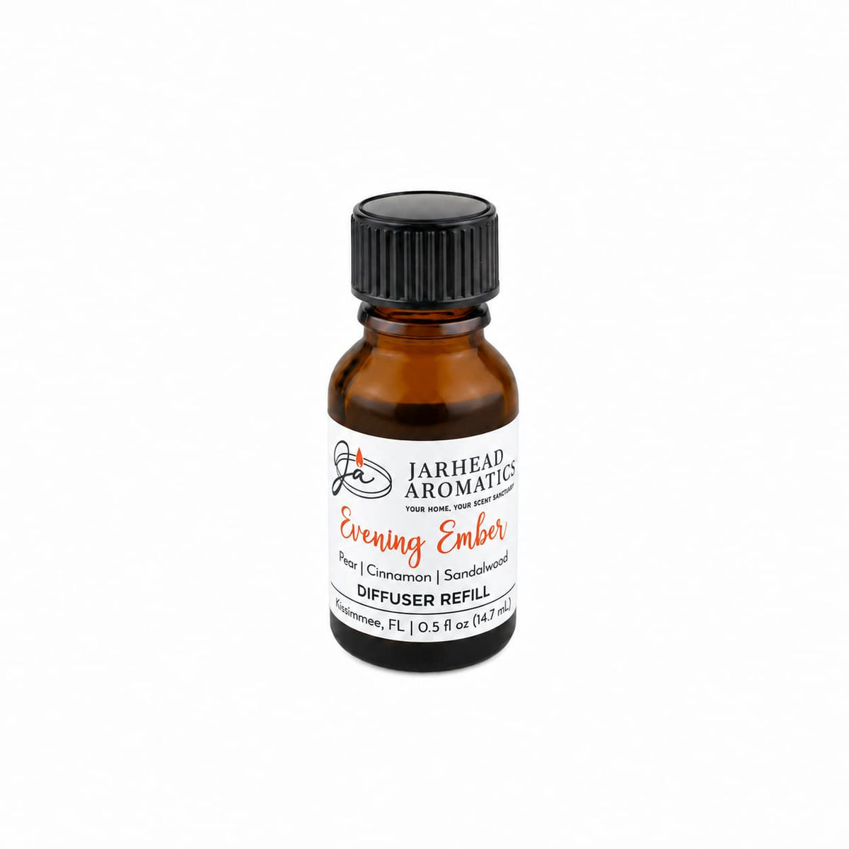 A small amber glass bottle with a black cap holds the Jarhead Aromatics Evening Ember Cold Air Diffuser Refill, featuring notes of plum, sandalwood, and soft smoke. This home fragrance oil offers a warm and inviting aroma, ideal for use as a cold air diffuser refill. The bottle contains 0.5 fl oz (14.7 ml).