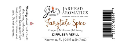 A Jarhead Aromatics Fairytale Spice Cold Air Diffuser Refill label, highlighting notes of gingerbread, molasses, and warm spice, evokes the cozy aroma of a holiday home scent. The warning advises to avoid contact with skin and eyes, and to keep out of reach of children and pets.