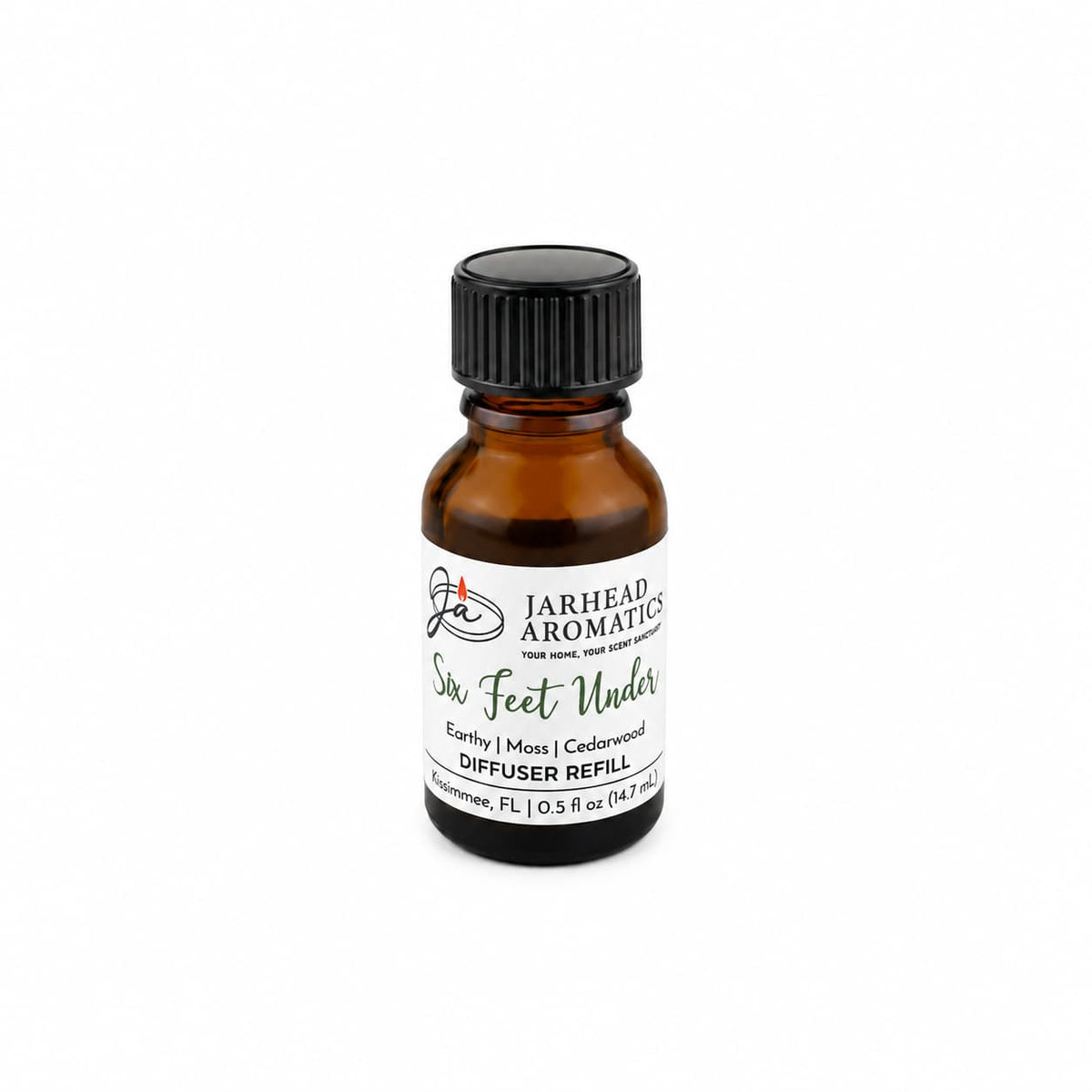A small amber glass bottle labeled Jarhead Aromatics Six Feet Under Cold Air Diffuser Refill | Damp Earth, Moss & Ancient Oak, featuring a black cap and standing upright on a white background—the perfect cold air diffuser refill for anyone seeking an earthy, mossy home fragrance with a touch of haunted Halloween atmosphere.