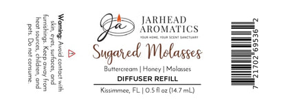 Jarhead Aromatics Sugared Molasses Cold Air Diffuser Refill label, showcasing a rich blend of dark molasses with notes of buttercream and honey. Ideal for use as a home fragrance oil or cold air diffuser refill, this product features safety warnings and comes in a 0.5 fl oz (14.7 ml) bottle. Black and brown text printed on a white background.