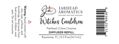 A Jarhead Aromatics Witches Cauldron Cold Air Diffuser Refill label showcasing safety warnings, scent notes of orange blossom, patchouli, and dark incense, a 0.5 fl oz size, and barcode—ideal for introducing an enchanting Halloween atmosphere to your home with this premium fragrance oil.