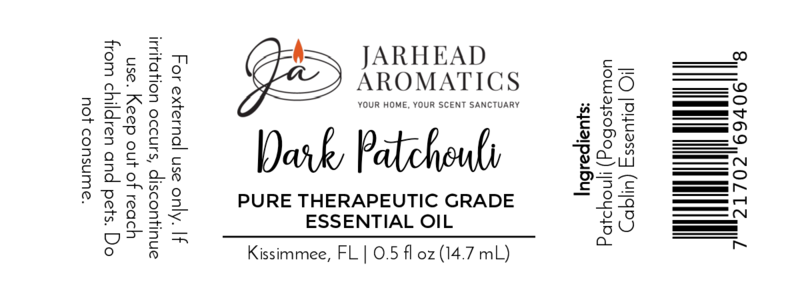 A label for Jarhead Aromatics Dark Patchouli Pure Therapeutic-Grade Essential Oil, 0.5 fl oz (14.7 mL), ideal for skincare and aromatherapy. Contains usage warnings and ingredient: Patchouli (Pogostemon Cablin) Essential Oil.