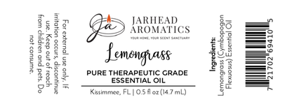 Label for Jarhead Aromatics Lemongrass Pure Therapeutic-Grade Essential Oil, 0.5 fl oz; ideal for aromatherapy or skincare. Contains ingredients, usage warnings, barcode, and Kissimmee, FL address. Black text on white background.