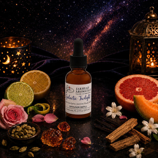 A Jarhead Aromatics Galactic Twilight Car Diffuser Refill, featuring notes of bergamot, amber, and sandalwood, rests amidst citrus fruits, wooden accents, flowers, spices, and lanterns beneath a starry night sky—evoking an enchanting aroma ideal for your next car diffuser refill.