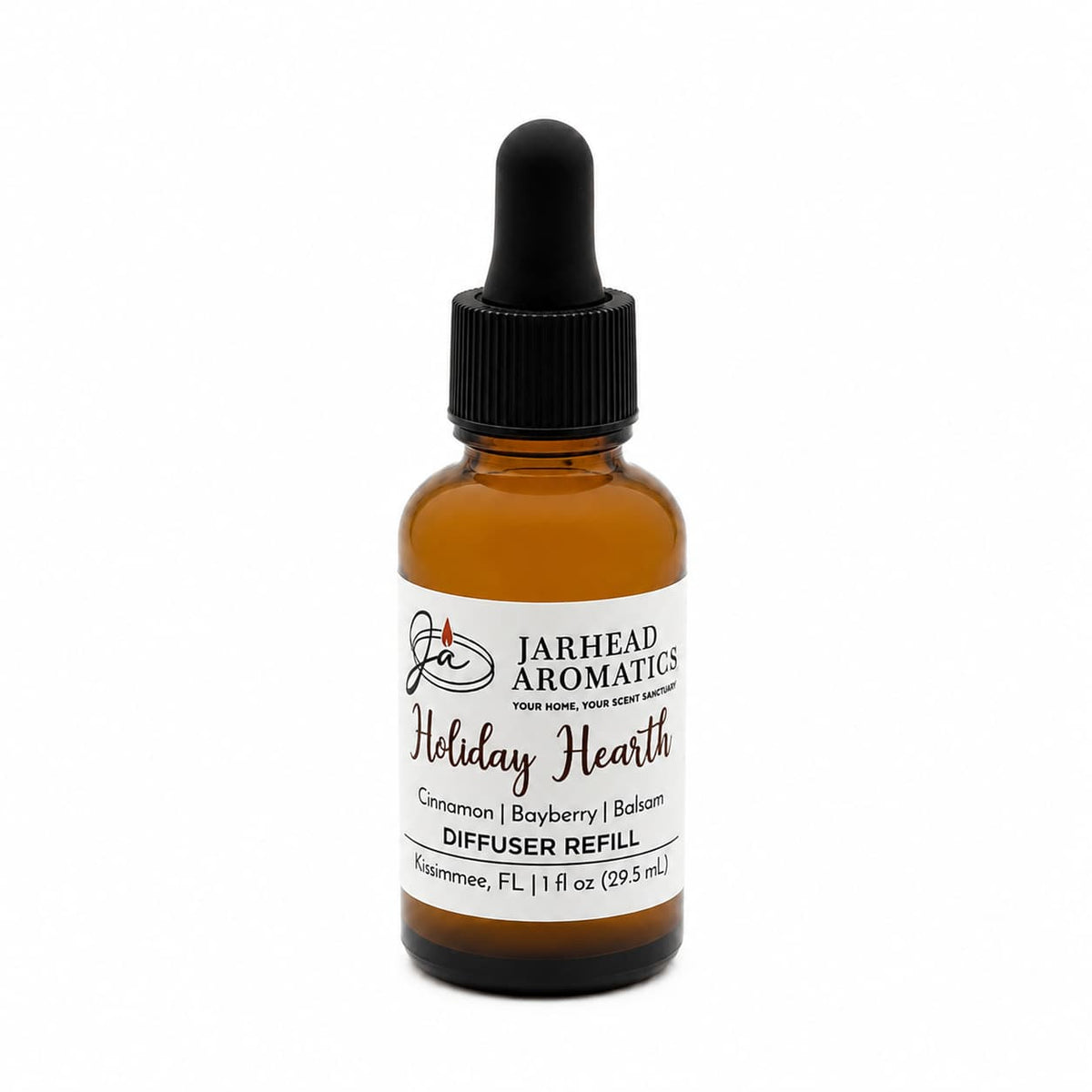 Amber glass Holiday Hearth Car Diffuser Refill | Cinnamon, Clove & Bayberry bottle with scent notes of cinnamon, bayberry, and balsam.