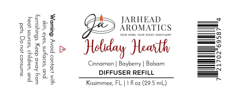 Product label for a Holiday Hearth Car Diffuser Refill | Cinnamon, Clove & Bayberry, listing safety warnings, scent notes of cinnamon, bayberry, and balsam, and a barcode for this Christmas car fragrance.