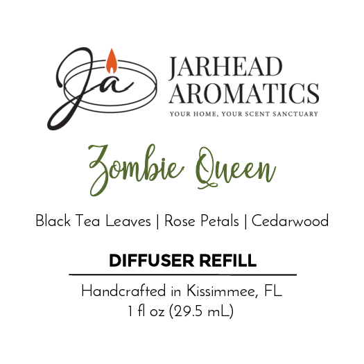 Label for Jarhead Aromatics Zombie Queen Car Diffuser Refill (Halloween Collection), black tea rose & cedarwood scent. Handcrafted in Kissimmee, FL. 1 fl oz (29.5 mL). Logo: flame above stylized initials.