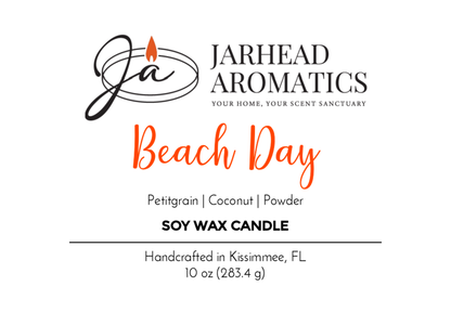 A “Jarhead Aromatics” label for the “Beach Day - Soy Wax Candle” features orange script, scent notes of petitgrain, coconut, powder—a summer beach fragrance with essential oils. Text: “Handcrafted in Kissimmee, FL, 10 oz (283.4 g)”.