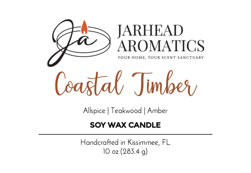 A candle label for Jarhead Aromatics' "Coastal Timber Soy Wax Candle | Teakwood, Leather & Amber Candle," featuring notes of teakwood, leather, and amber. This woodsy scented candle displays “Soy Wax Candle” and “Handcrafted in Kissimmee, FL, 10 oz (283.4 g).”.