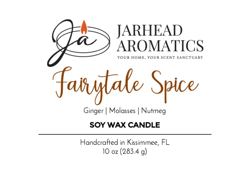 Jarhead Aromatics Fairytale Spice Soy Wax Candle | Gingerbread, Cinnamon & Vanilla features the warm, festive aroma of gingerbread, cinnamon, and vanilla—making it the perfect holiday-scented candle. Handcrafted in Kissimmee, FL. 10 oz (283.4g). Embellished with a stylized JA logo crowned by a flame.