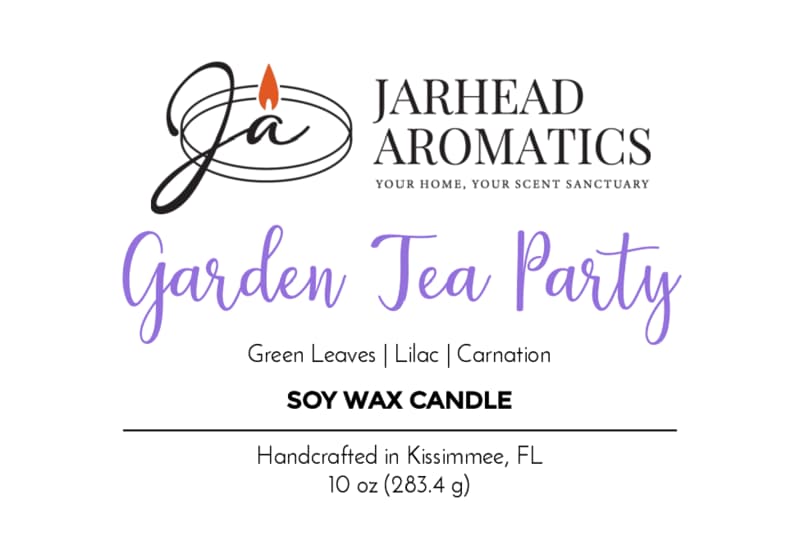 Jarhead Aromatics Garden Tea Party Soy Wax Candle | Rose, Jasmine & Green Floral Hand-poured soy candle handcrafted in Kissimmee, FL. Features a lush floral fragrance with notes of rose, jasmine, and fresh green botanicals. Black and purple text with a candle flame logo.