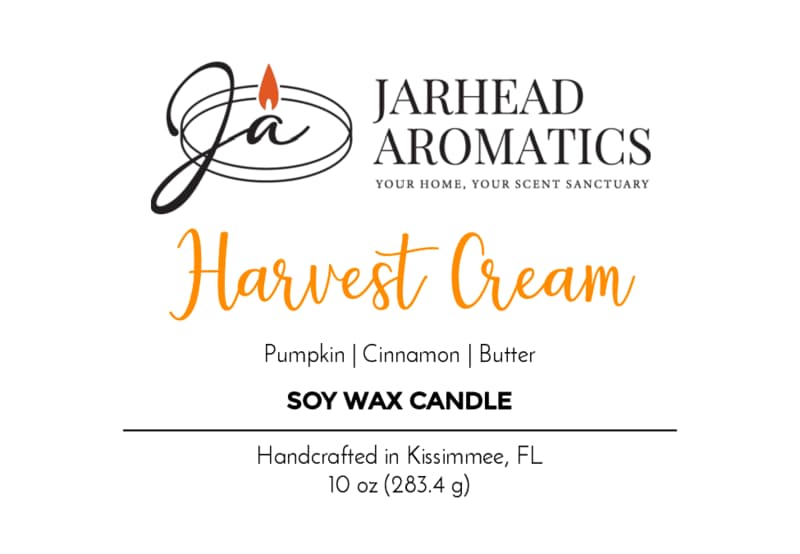 Jarhead Aromatics Harvest Cream Soy Wax Candle label highlights an irresistible autumn blend of pumpkin spice, brown sugar, and vanilla. Handcrafted in Kissimmee, FL, the design features black and orange text with a candle flame logo—making it the perfect fall candle for the season.