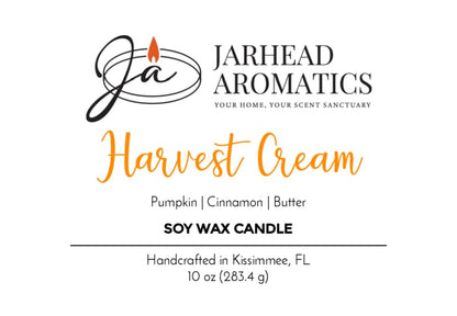 Jarhead Aromatics Harvest Cream Soy Wax Candle label highlights an irresistible autumn blend of pumpkin spice, brown sugar, and vanilla. Handcrafted in Kissimmee, FL, the design features black and orange text with a candle flame logo—making it the perfect fall candle for the season.