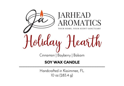 Jarhead Aromatics Holiday Hearth Soy Wax Candle label features a flame logo. This festive candle blends Cinnamon Clove, Bayberry, and Balsam fragrances to create a warm holiday atmosphere. Handcrafted in Kissimmee, FL. Net weight: 10 oz (283.4 g).