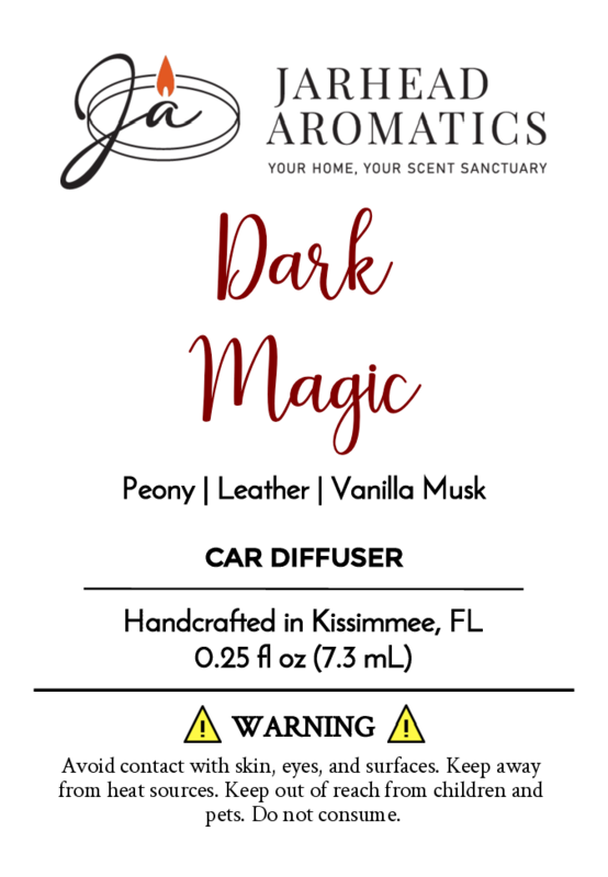 Label for Jarhead Aromatics Dark Magic - Car Diffuser (Halloween Collection), handcrafted in Kissimmee, FL. Features peony, leather & vanilla musk for a floral aroma. Volume: 0.25 fl oz (7.3 mL). Usage warnings included.