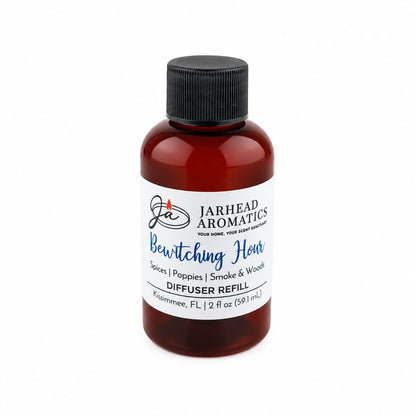 A brown bottle of Jarhead Aromatics’ Bewitching Hour Diffuser Refill—featuring an alluring blend of exotic spices, dark florals, and smoky woods—radiates gothic elegance. With a sleek black cap and 2 fl oz of home fragrance liquid, this refill transforms any space with its enchanting aroma.