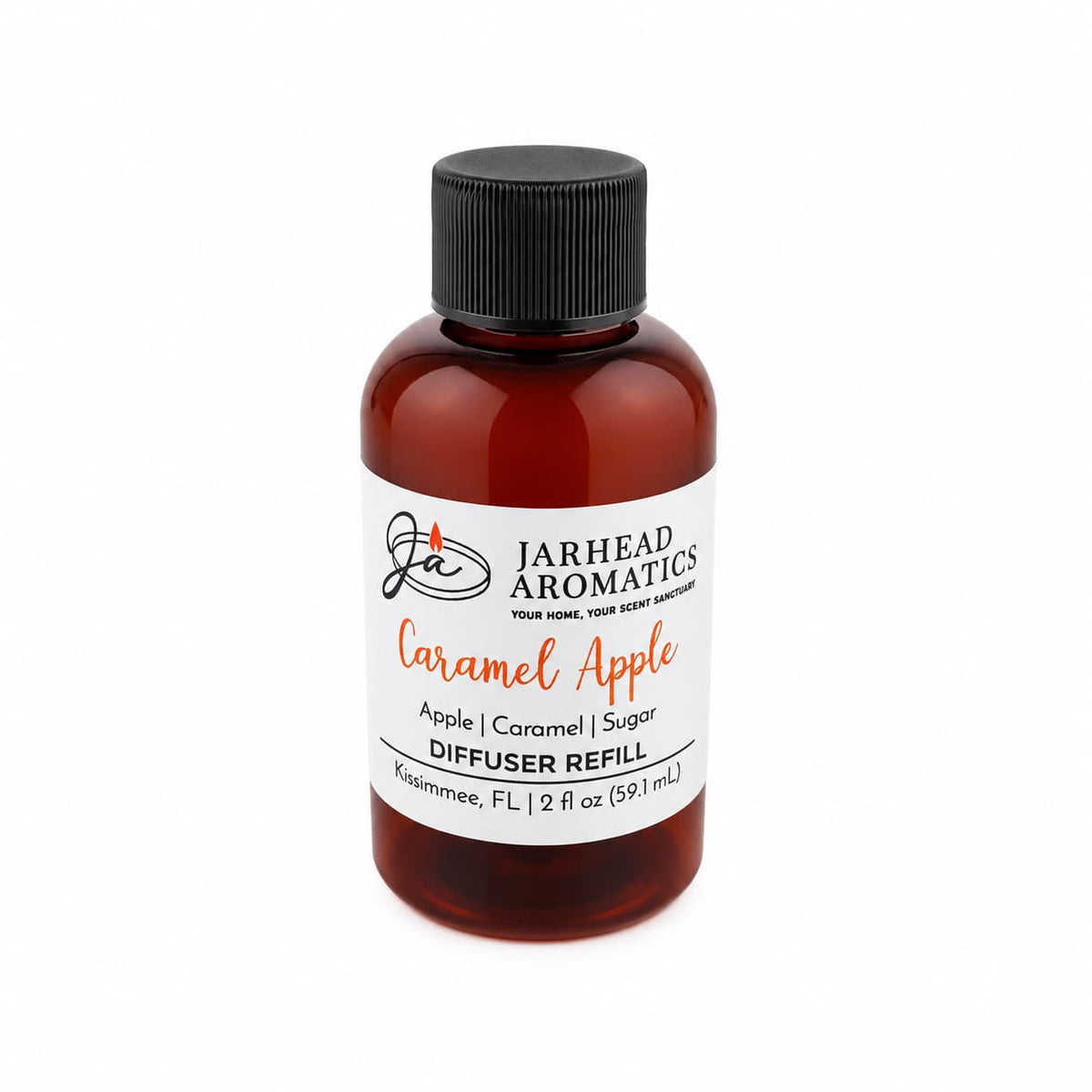 A brown bottle labeled Jarhead Aromatics Caramel Apple Diffuser Refill fills your space with the inviting scent of crisp apple, rich caramel, and warm spice—a cozy autumn fragrance. This home fragrance bottle contains 2 fl oz (59.1 mL).