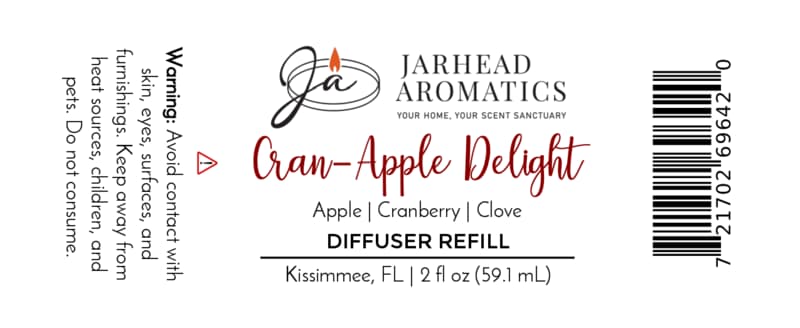 Jarhead Aromatics Cran-Apple Delight Diffuser Refill | Cranberry, Apple & Warm Cinnamon Experience an autumn-inspired fragrance with notes of crisp apple, tart cranberry, and warm cinnamon. Avoid contact with skin and surfaces. Size: 2 fl oz. Produced in Kissimmee, FL.