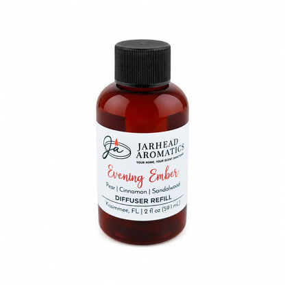 A brown bottle labeled Jarhead Aromatics Evening Ember Diffuser Refill, featuring plum, sandalwood, and soft smoke scents, 2 fl oz (59 ml), with a black cap—perfect for elevating your home fragrance experience.