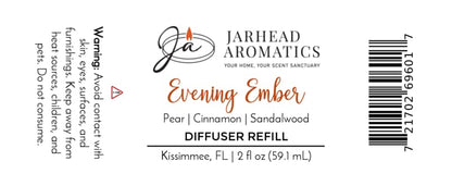 Product label for Jarhead Aromatics Evening Ember Diffuser Refill, a premium home fragrance featuring notes of plum, sandalwood, and soft smoke. Includes safety warnings, barcode, and product size (2 fl oz).