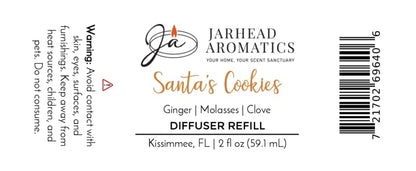 Product label for a Jarhead Aromatics Santa’s Cookies Diffuser Refill | Ginger, Brown Sugar, Molasses & Vanilla, featuring scent notes, a warning statement, and a barcode.