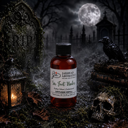 A bottle of Jarhead Aromatics’ Six Feet Under Diffuser Refill | Damp Earth, Moss & Ancient Oak rests on mossy earth in a mysterious graveyard at night. Surrounded by a skull, raven, old books, lantern, and weathered tombstones beneath a glowing full moon, the earthy aroma of damp earth, rich moss, and ancient oak fills the air—infusing the haunting scene with evocative fragrance.