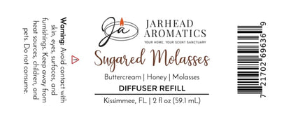 A Jarhead Aromatics Sugared Molasses Diffuser Refill label showcasing essential product details (2 fl oz, Kissimmee, FL), a barcode, and prominent safety warnings. Refresh your home this autumn with the comforting blend of buttercream, honey, and dark molasses—an inviting fragrance upgrade courtesy of Jarhead Aromatics.
