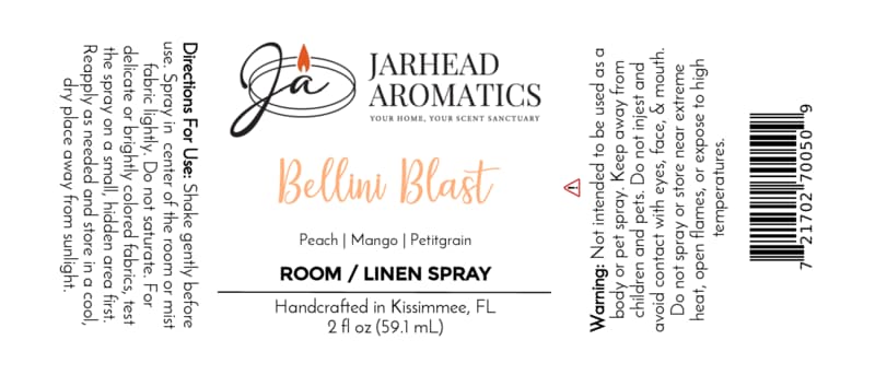 Jarhead Aromatics Bellini Blast Room & Linen Spray | Peach, Mango & Tangerine label featuring our flame logo, barcode, and complete directions and warnings. This handcrafted room spray infuses any space with tropical home fragrance notes of peach, mango, and tangerine. Made in Kissimmee, FL — 2 fl oz bottle.