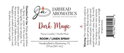 Jarhead Aromatics Dark Magic Room & Linen Spray label, featuring directions, warnings, and fragrance notes of peach, plum, dark florals, and vanilla musk. This handcrafted home fragrance is made in Kissimmee, FL and contains 2 fl oz (59.1 mL).