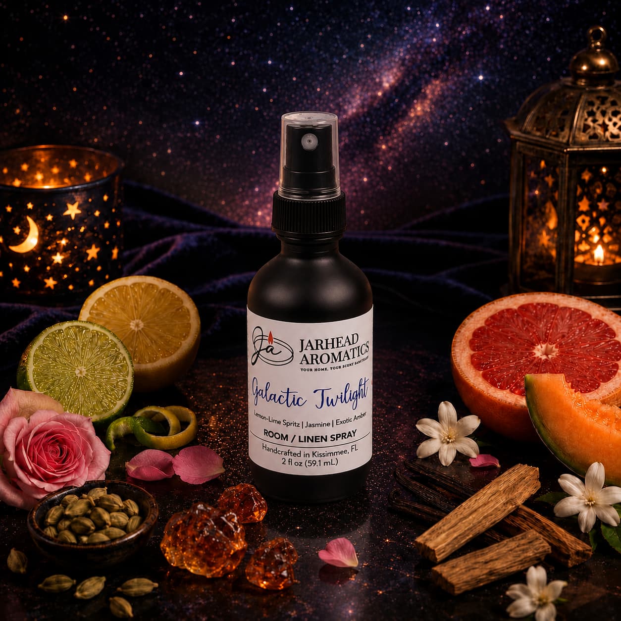 A bottle of Jarhead Aromatics Galactic Twilight Room & Linen Spray | Bergamot, Amber & Sandalwood is artfully displayed among citrus fruits, delicate flowers, amber stones, sandalwood pieces, and glowing candles against a star-studded galaxy backdrop, capturing the essence of an opulent home fragrance experience.