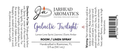A product label for Jarhead Aromatics’ Galactic Twilight Room & Linen Spray, a luxurious home fragrance featuring bergamot, amber, and sandalwood scents. Directions, warnings, barcode, and logo are shown. The bottle size is 2 fl oz.