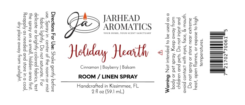 Product label for Holiday Hearth Room & Linen Spray, featuring the scent notes of Cinnamon Clove, Bayberry & Balsam by Jarhead Aromatics, including ingredients, directions, warnings, and a barcode.
