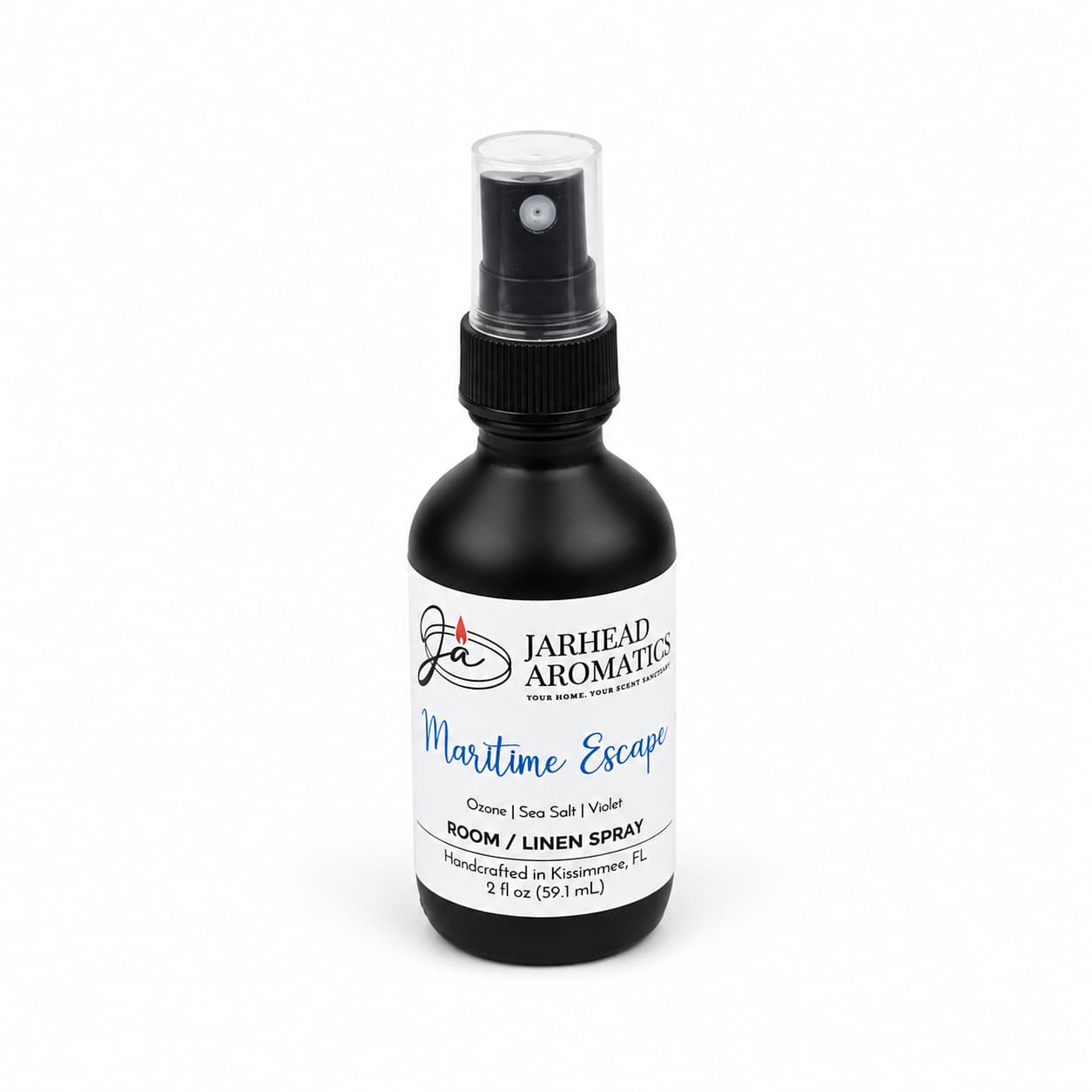 A 2 fl oz black spray bottle of Jarhead Aromatics Maritime Escape Room & Linen Spray | Sea Salt, Ozone & Jasmine is shown with blue and white accents on a white background. This home fragrance captures a refreshing coastal aroma crafted to evoke the calm of the sea in any room or linen closet.
