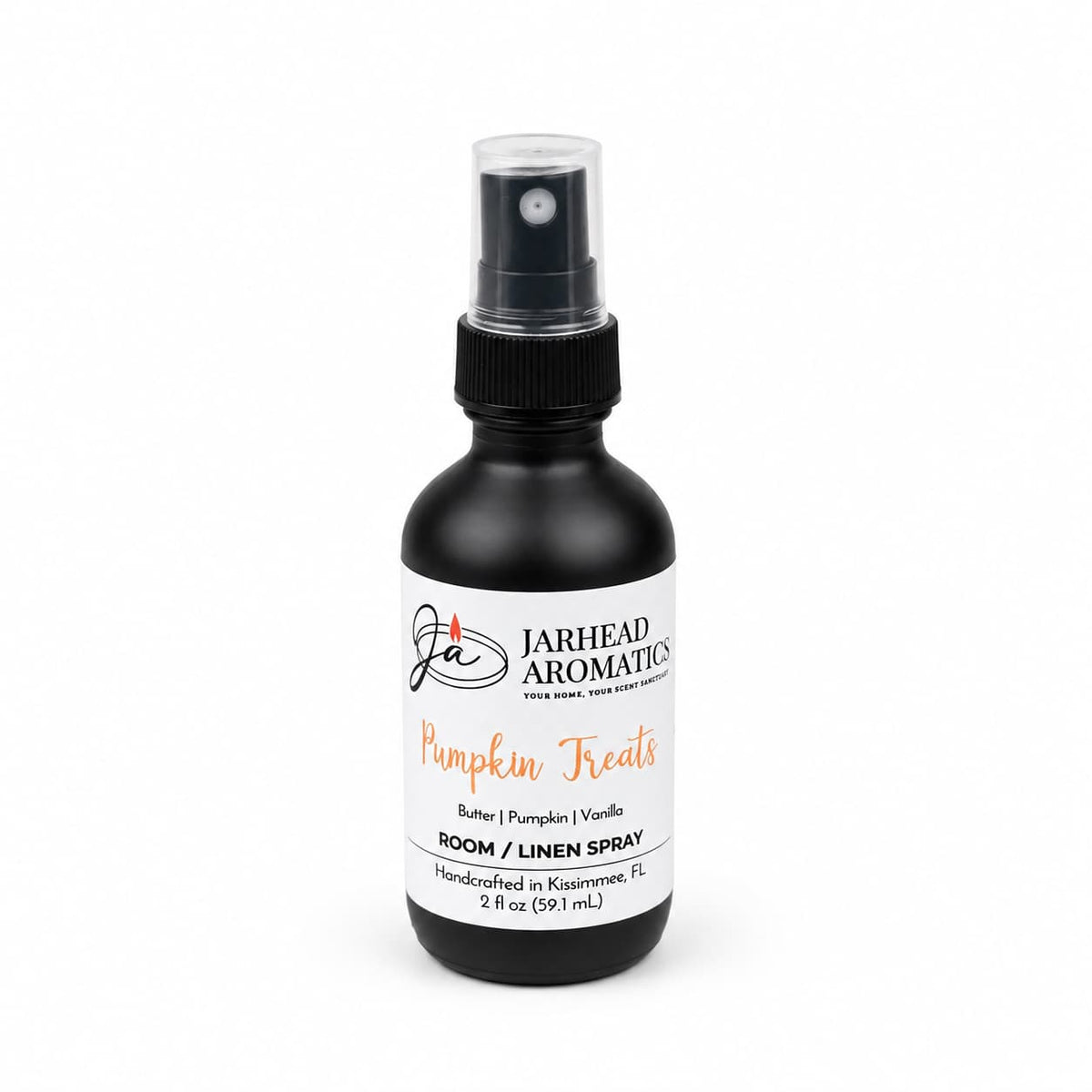 A bottle of Jarhead Aromatics Pumpkin Treats Room & Linen Spray with a black spray top and white label, featuring an irresistible blend of pumpkin, caramel, and maple pecan—perfect for bringing a cozy home fragrance to any space.