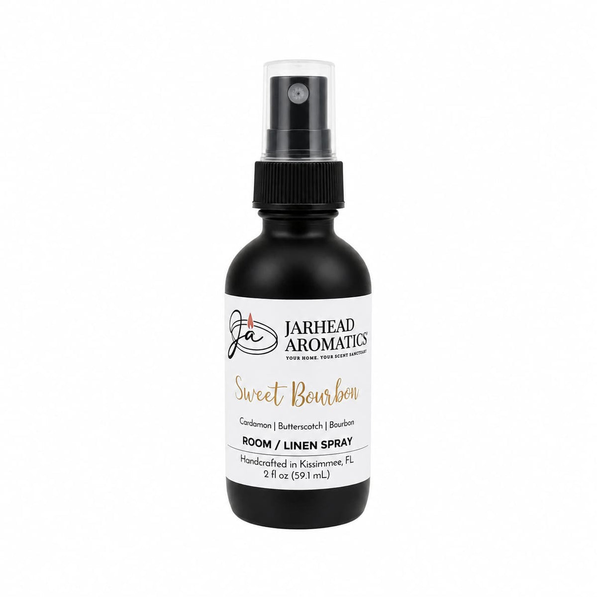 A black spray bottle of Jarhead Aromatics Sweet Bourbon Room & Linen Spray (2 fl oz), featuring a rich blend of bourbon, butterscotch, and brown sugar notes. Handcrafted in Kissimmee, FL, this luxurious gourmand fragrance enhances any space and is elegantly displayed on a white background.