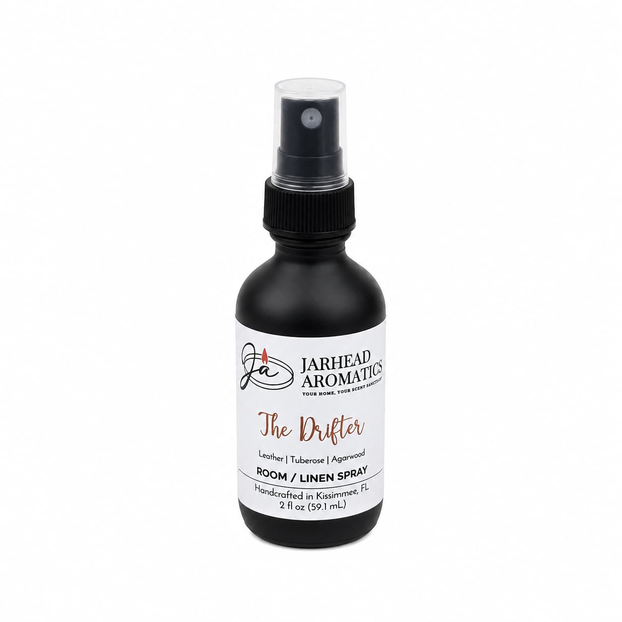 Introducing The Drifter Room & Linen Spray by Jarhead Aromatics, a 2 fl oz (59 mL) black spray bottle that infuses your space with a sophisticated blend of leather, tuberose, and smoky agarwood. This western-inspired fragrance adds rugged elegance and refreshing character to any room or linen.