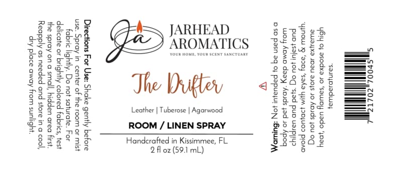 White label for Jarhead Aromatics The Drifter Room & Linen Spray | Leather, Tuberose & Smoky Agarwood. This western-inspired fragrance blends leather, tuberose, and smoky agarwood for a distinctive leather home scent. Includes usage directions, safety warning, product size (2 fl oz), and origin (Kissimmee, FL).