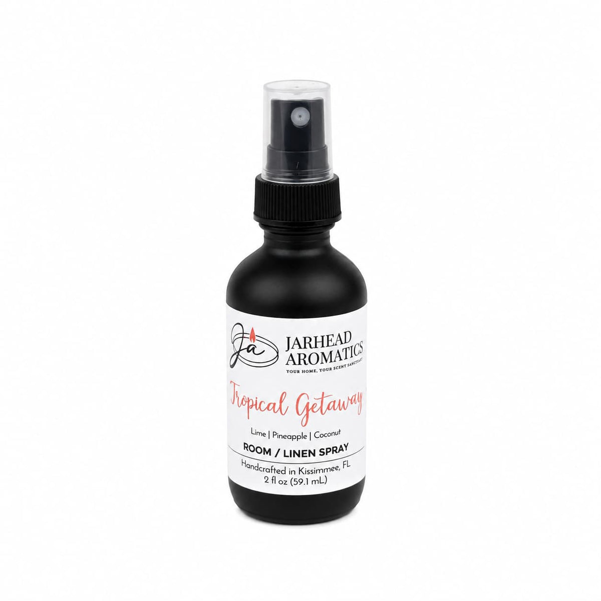 A black spray bottle labeled Jarhead Aromatics Tropical Getaway Room & Linen Spray features a vibrant home fragrance with coconut, mango, and pineapple scents. Handcrafted in Kissimmee, FL, this 2 fl oz tropical spray is ideal for linens or any space seeking a breezy getaway aroma.