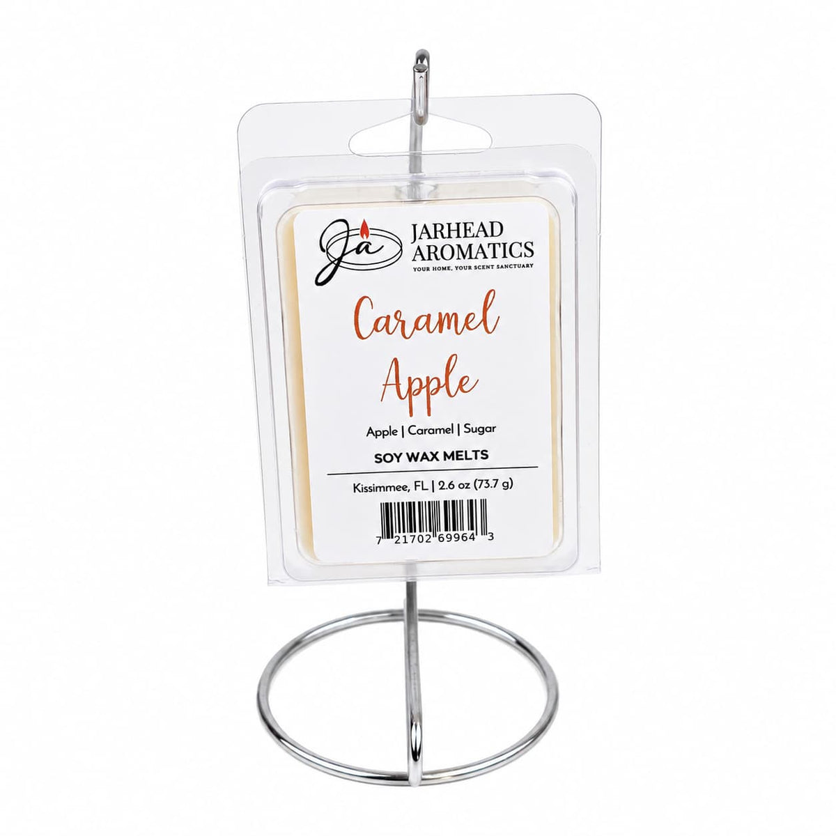 A package of Jarhead Aromatics Caramel Apple Soy Wax Melt | Crisp Apple, Rich Caramel & Warm Spice stands upright on a silver metal stand against a white background, showcasing this bakery-inspired wax melt that’s perfect for filling any space with cozy fall fragrance.