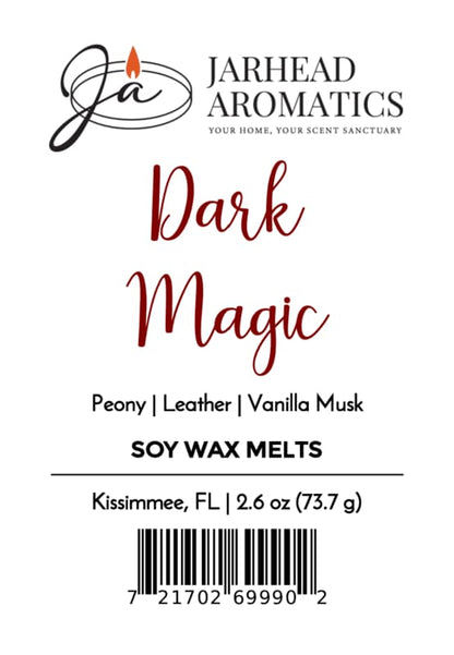Jarhead Aromatics Dark Magic Soy Wax Melt Experience the alluring aroma of peach, plum, dark florals, and vanilla musk in these premium soy wax melts. Handcrafted in Kissimmee, FL. Net wt. 2.6 oz | Barcode | Company logo with candle flame.