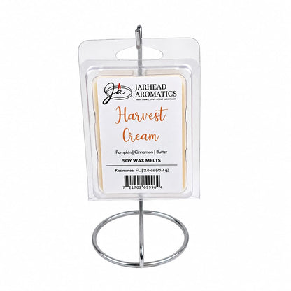 A pack of Jarhead Aromatics Harvest Cream Soy Wax Melts in the Pumpkin Spice, Brown Sugar & Vanilla Cream scent is displayed on a silver metal stand against a white background.