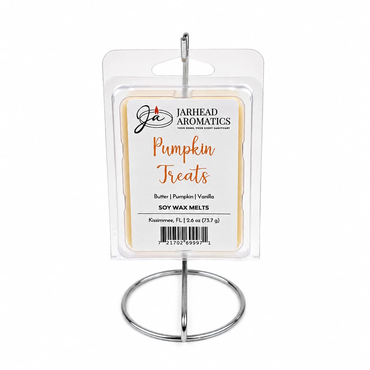 A package of Jarhead Aromatics Pumpkin Treats Soy Wax Melt—with notes of pumpkin, caramel, and maple pecan—is displayed on a simple silver metal stand against a white background.