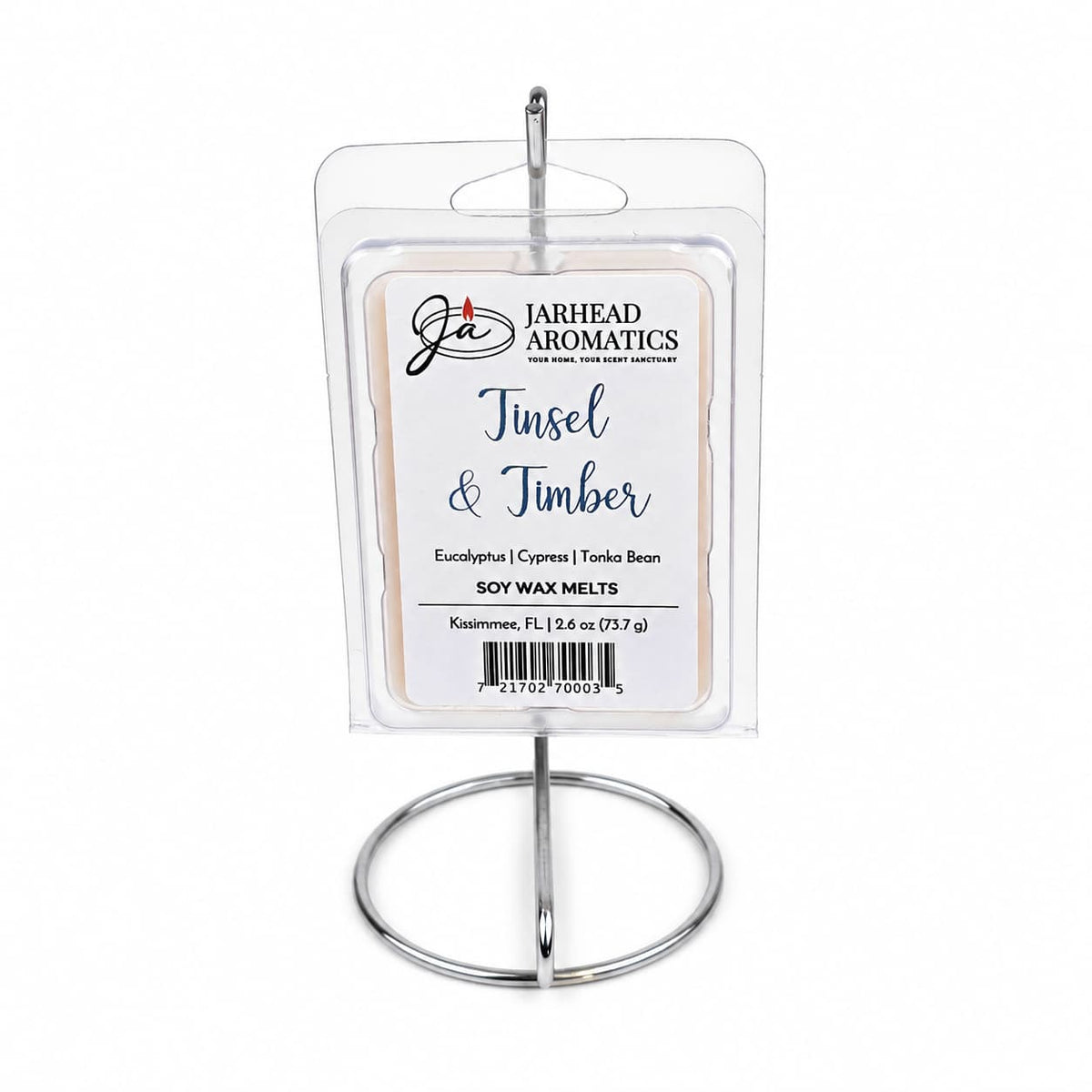 Tinsel & Timber Soy Wax Melt | Fresh Pine Christmas Tree Holiday Scent hanging on a circular metal stand, featuring the holiday fragrance notes of Eucalyptus, Cypress, and Tonka Bean.
